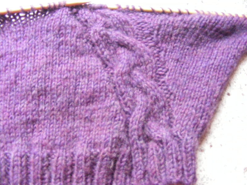 point de croix sur un tricot