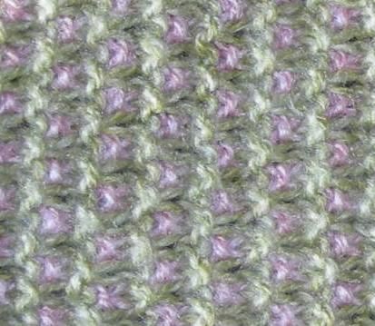 point de croix sur un tricot